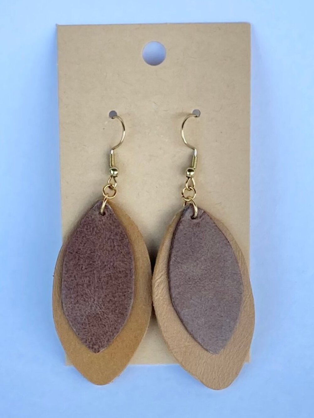 Handmade brown earrings made from genuine leather and stainless steel hardware
